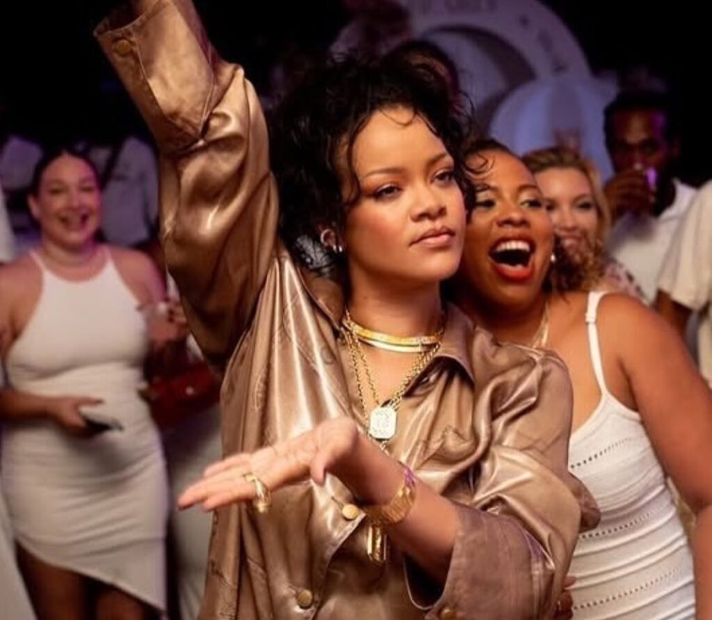 99-Rihanna-Attends-Her-Brothers-Gender-Reveal-in-an-Alexander-Wang-Gold-Trompe-LOeil-Metallic-Workwe.jpeg