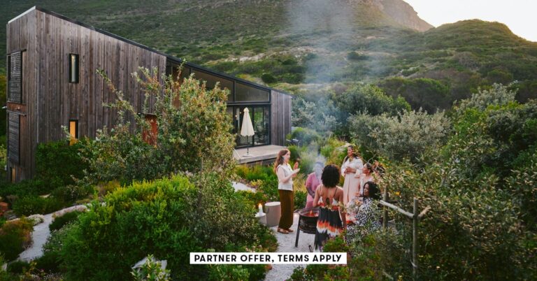 SOCIAL-IMAGE_PARTNER-OFFER-TERMS-APPLY_Group-of-diverse-women-talking-together-over-drinks-around-a.jpeg