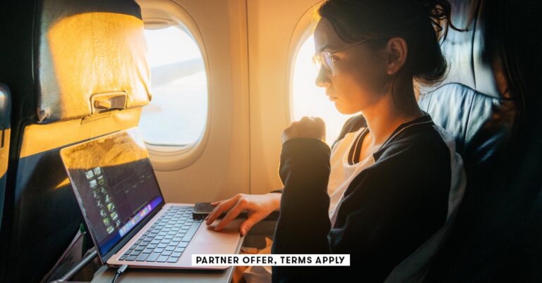 SOCIAL-IMAGE_PARTNER-OFFER-TERMS-APPLY_Woman-working-with-laptop-in-the-airplane_Oleh_Slobodeniuk_24.jpeg