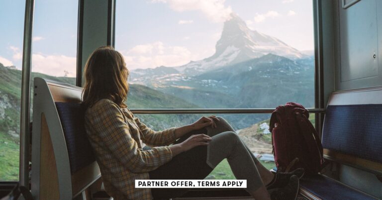 SOCIAL-IMAGE_PARTNER-OFFERS-TERMS-APPLY_woman-traveling-on-the-train-near-Matterhorn-Swiss-Alps_-Ole.jpeg