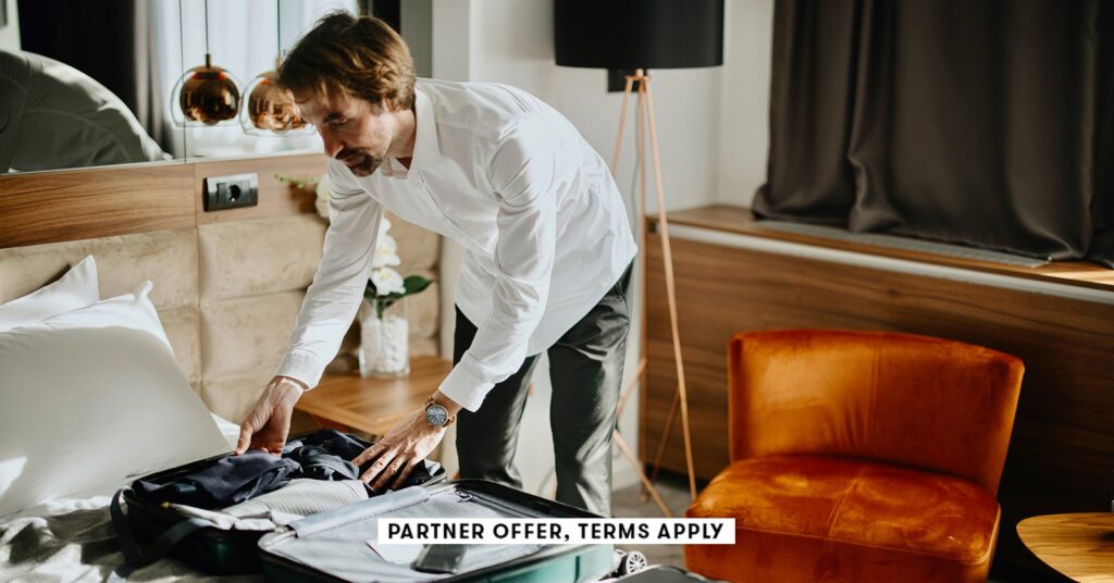 SOCIAL-IMAGE_PARTNER-OFFER-TERMS-APPLY_Business-traveler-packing-up-suitcase-in-hotel_Anchiy_SOCIAL.jpeg