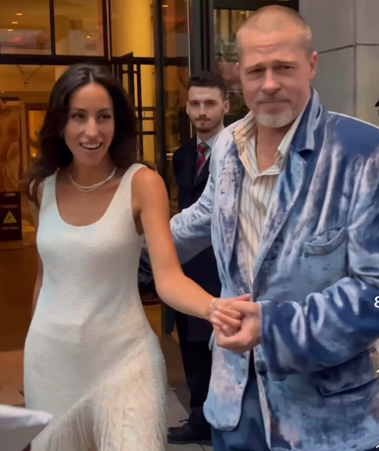 Brad-Pitt-Wears-Blue-Velvet-Willy-Chavarria-Blazer-as-Ines-de-Ramon-Stuns-in-Ivory-Silk-Boucle-Fring.jpeg